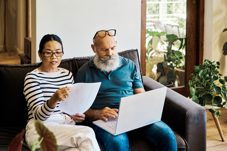 A couple reviewing their retirement plan.